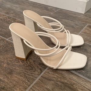 Snakeskin slip on heels